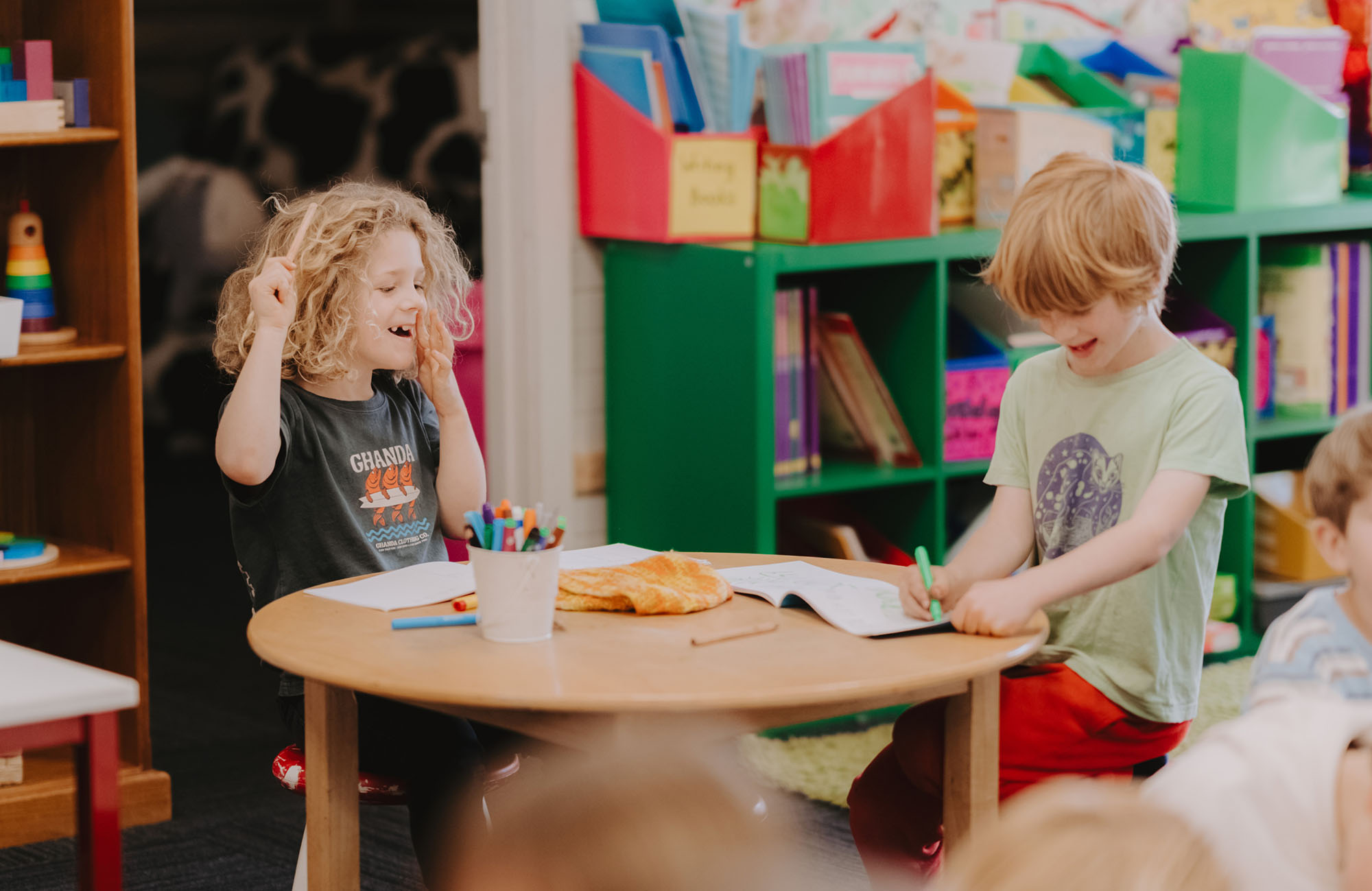 Two happy children in Humanities Classroom at Candlebark School